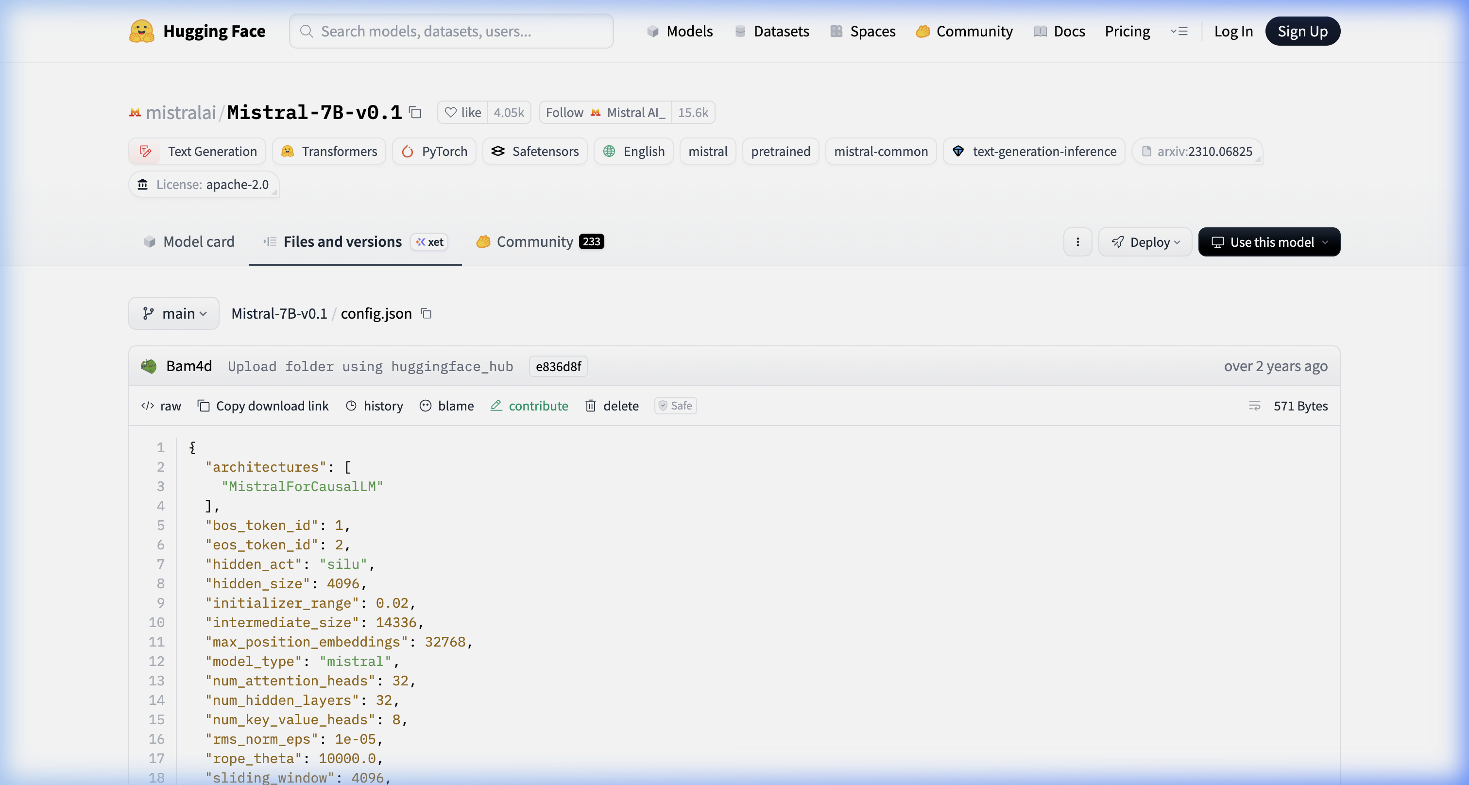 Mistral 7B config.json on HuggingFace showing num_attention_heads: 32, num_key_value_heads: 8, sliding_window: 4096